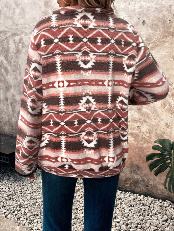 Woman in a cream half-zip fleece pullover
