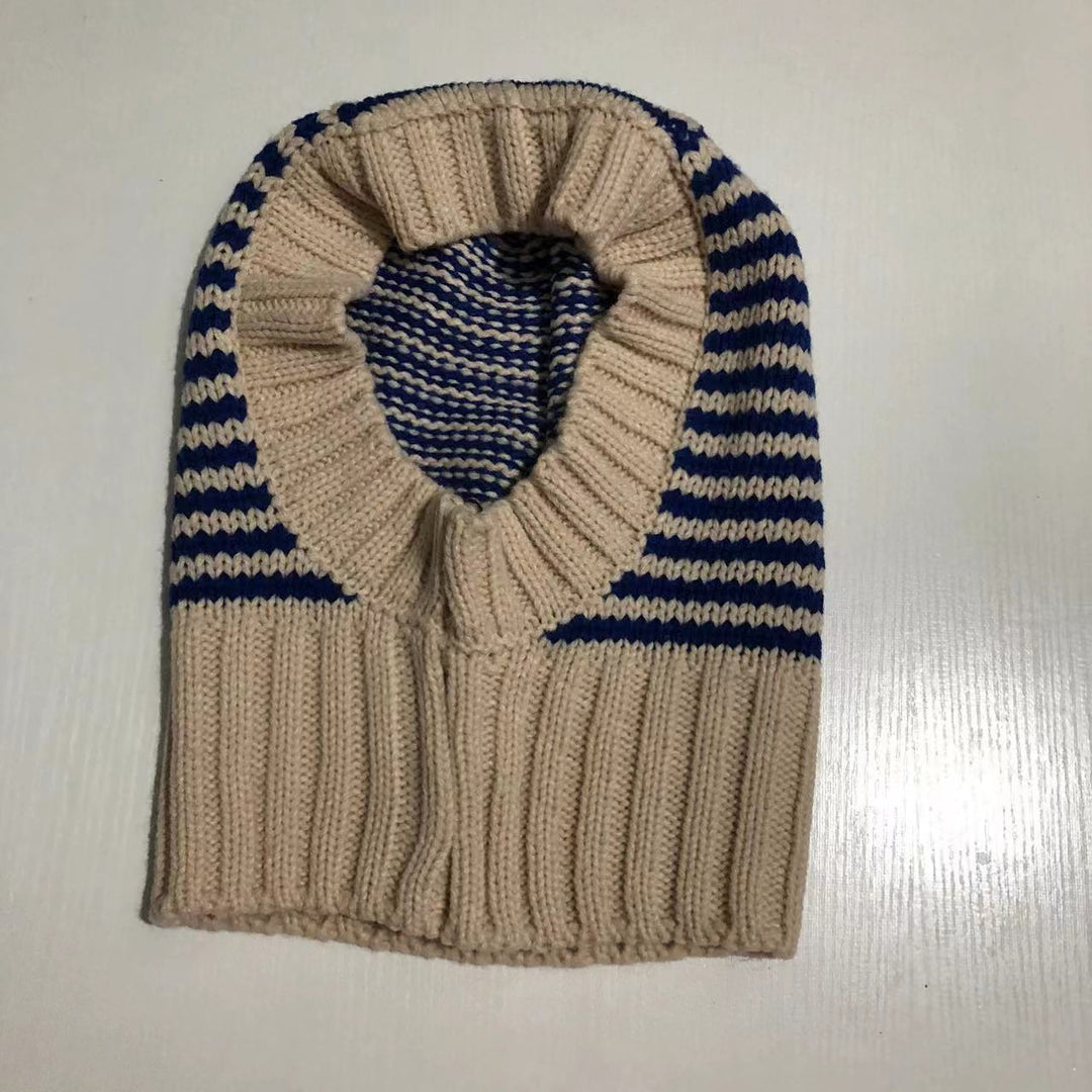 Person wearing striped knit balaclava hood
