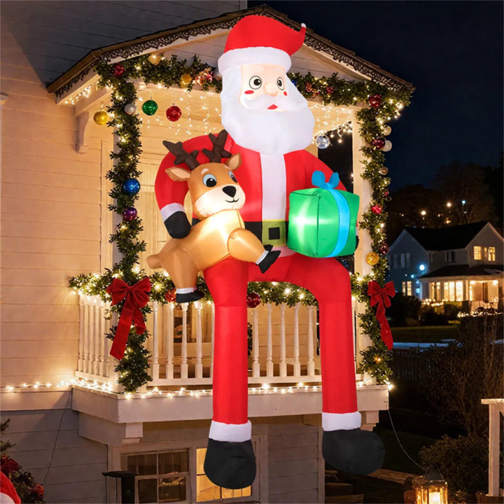 Giant inflatable sitting Santa with reindeer
