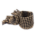 Man wearing a tan shemagh scarf