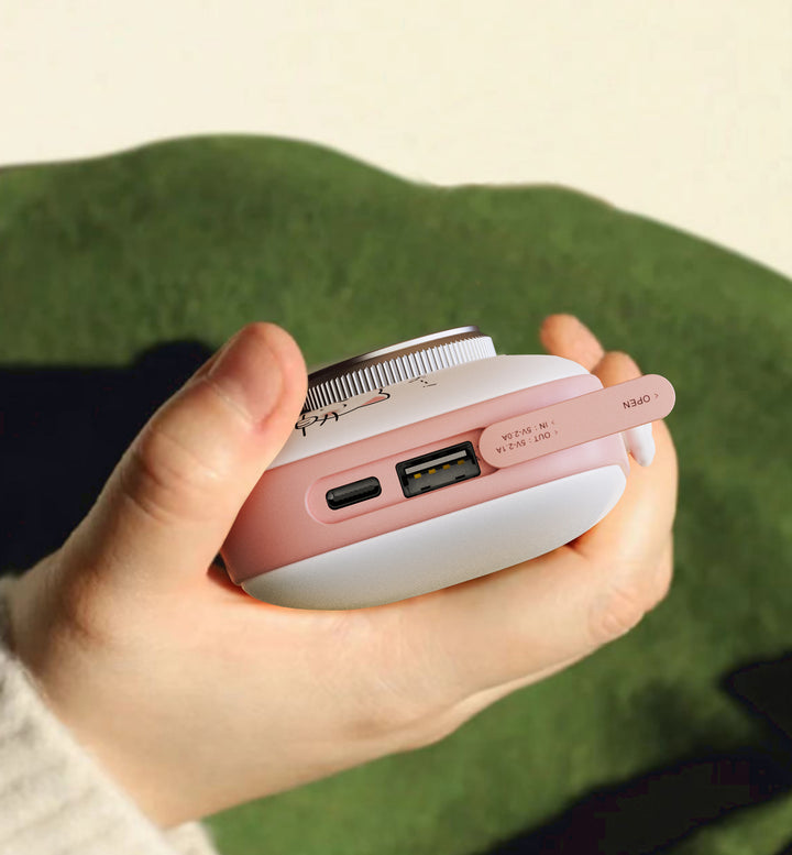 Pink camera-shaped hand warmer power bank
