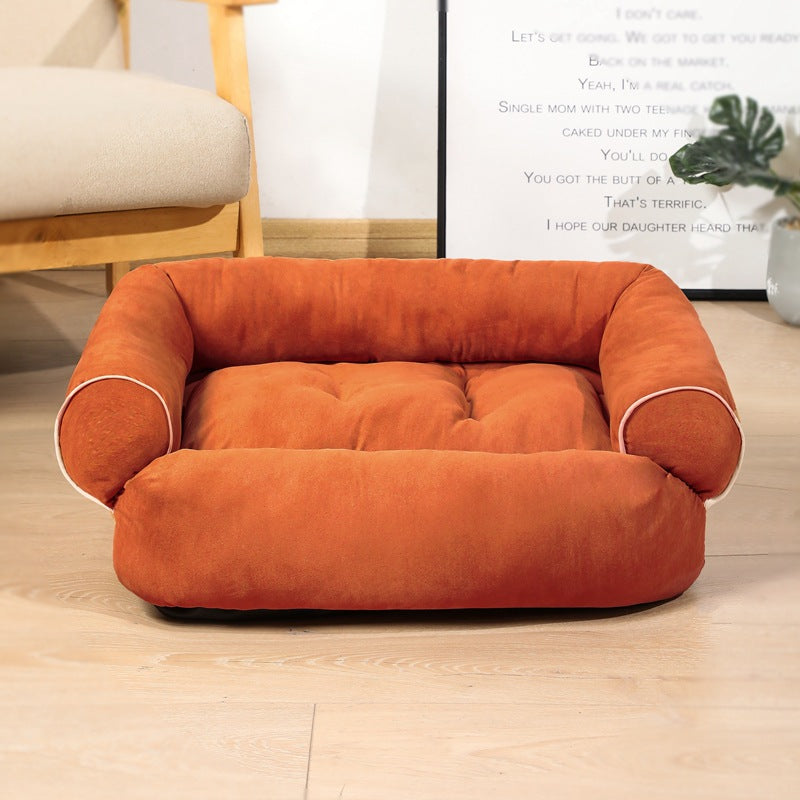 Plush sofa-style pet bed with bolsters