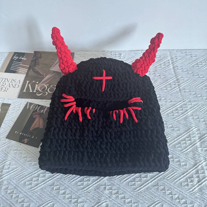 Black chunky crochet bucket hat with pink horns