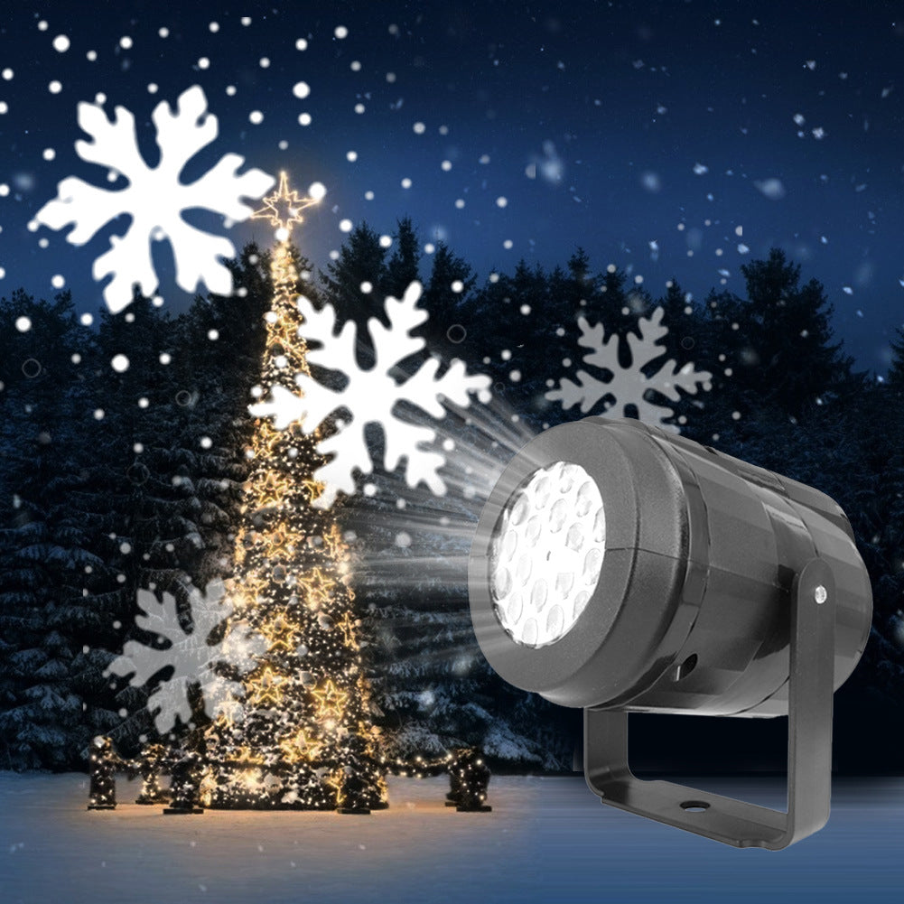 Snowflake projector lighting a house