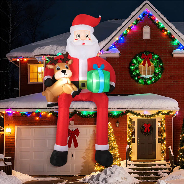Giant inflatable sitting Santa with reindeer