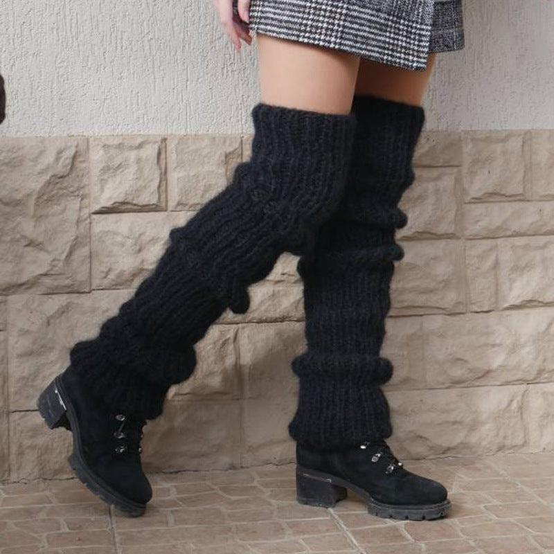 Chunky slouchy knit leg warmers over boots