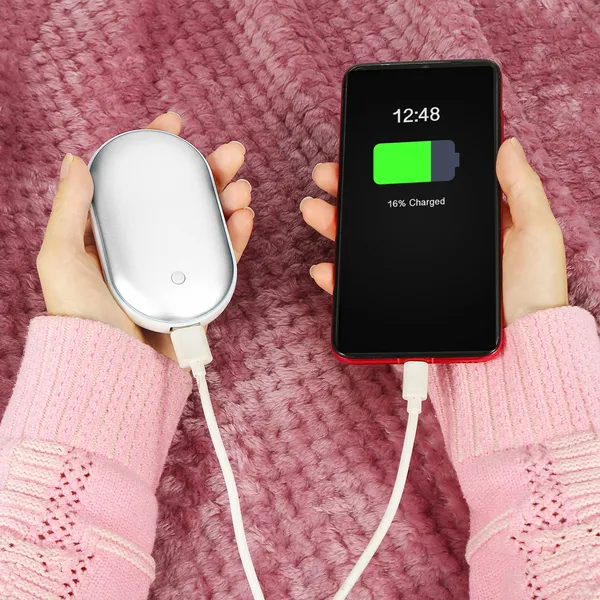 Silver pebble hand warmer and power bank