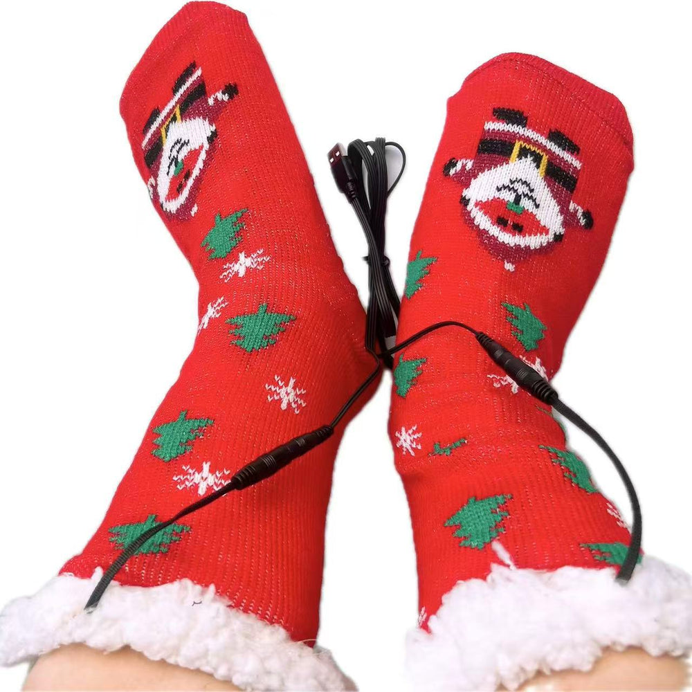 Red knitted Christmas socks with Santa pattern