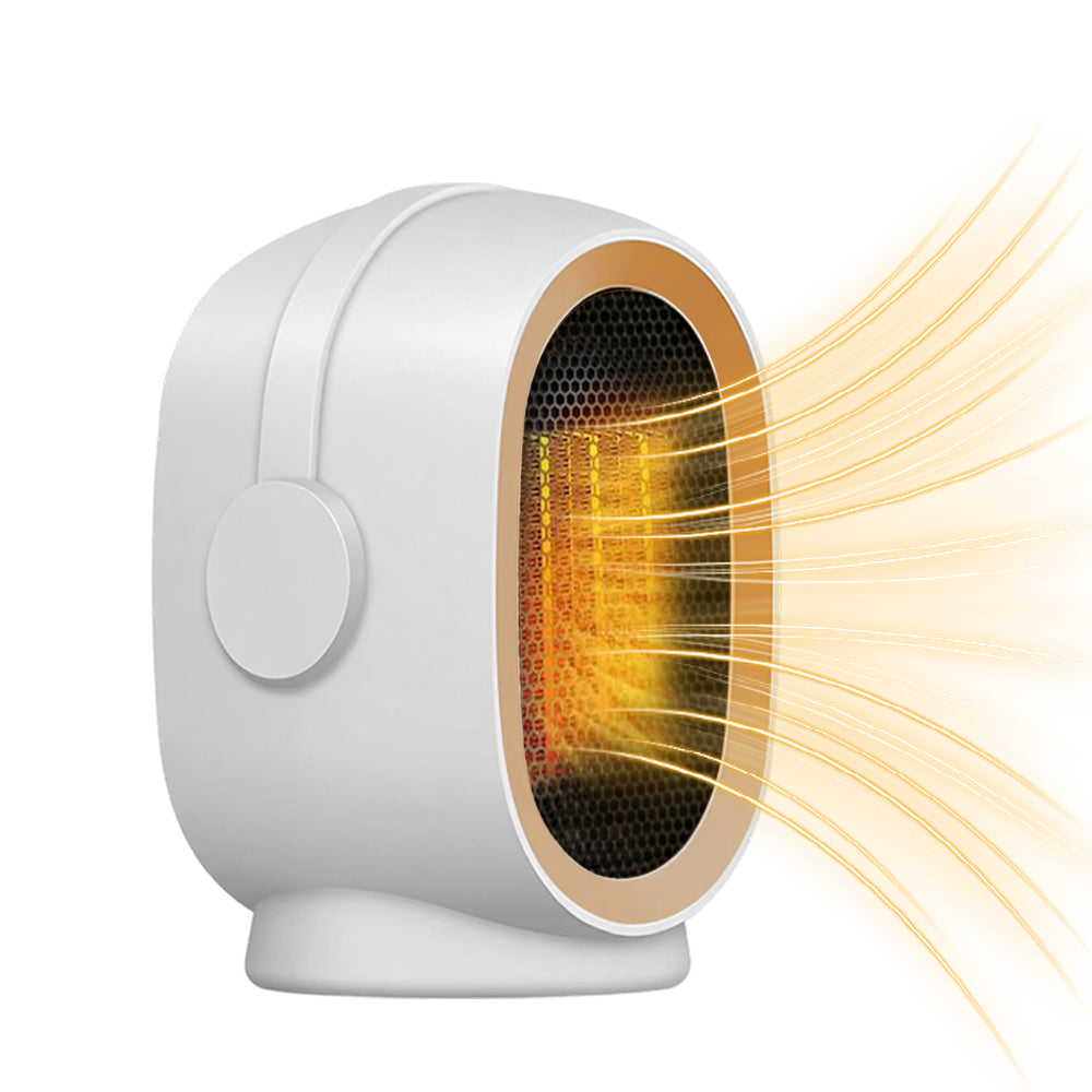 Compact ceramic space heater on desk