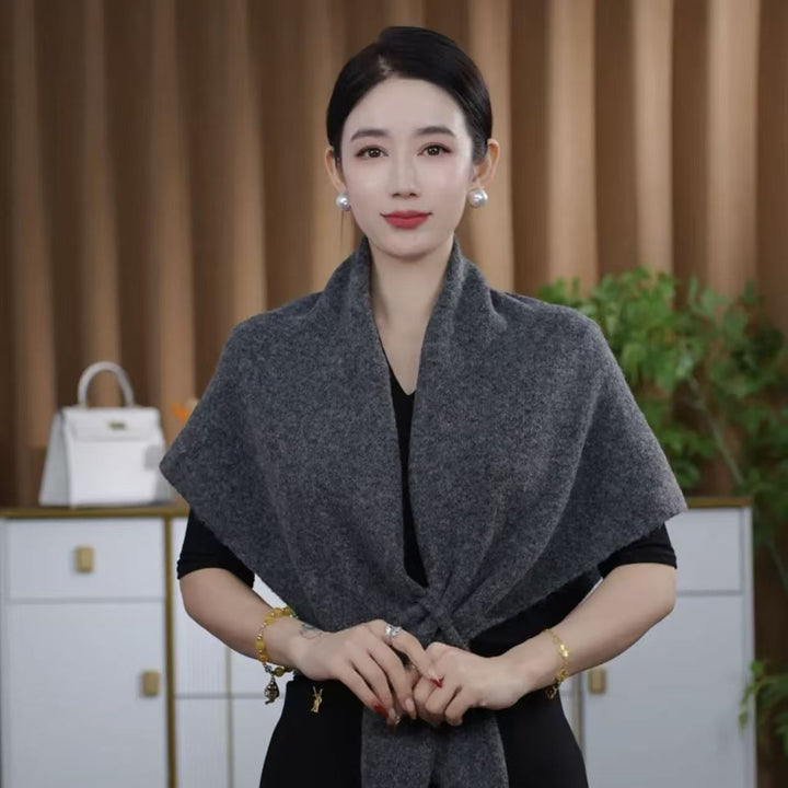 Woman wearing a wool triangle shawl