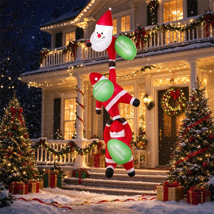 Three inflatable Santas climbing a balcony