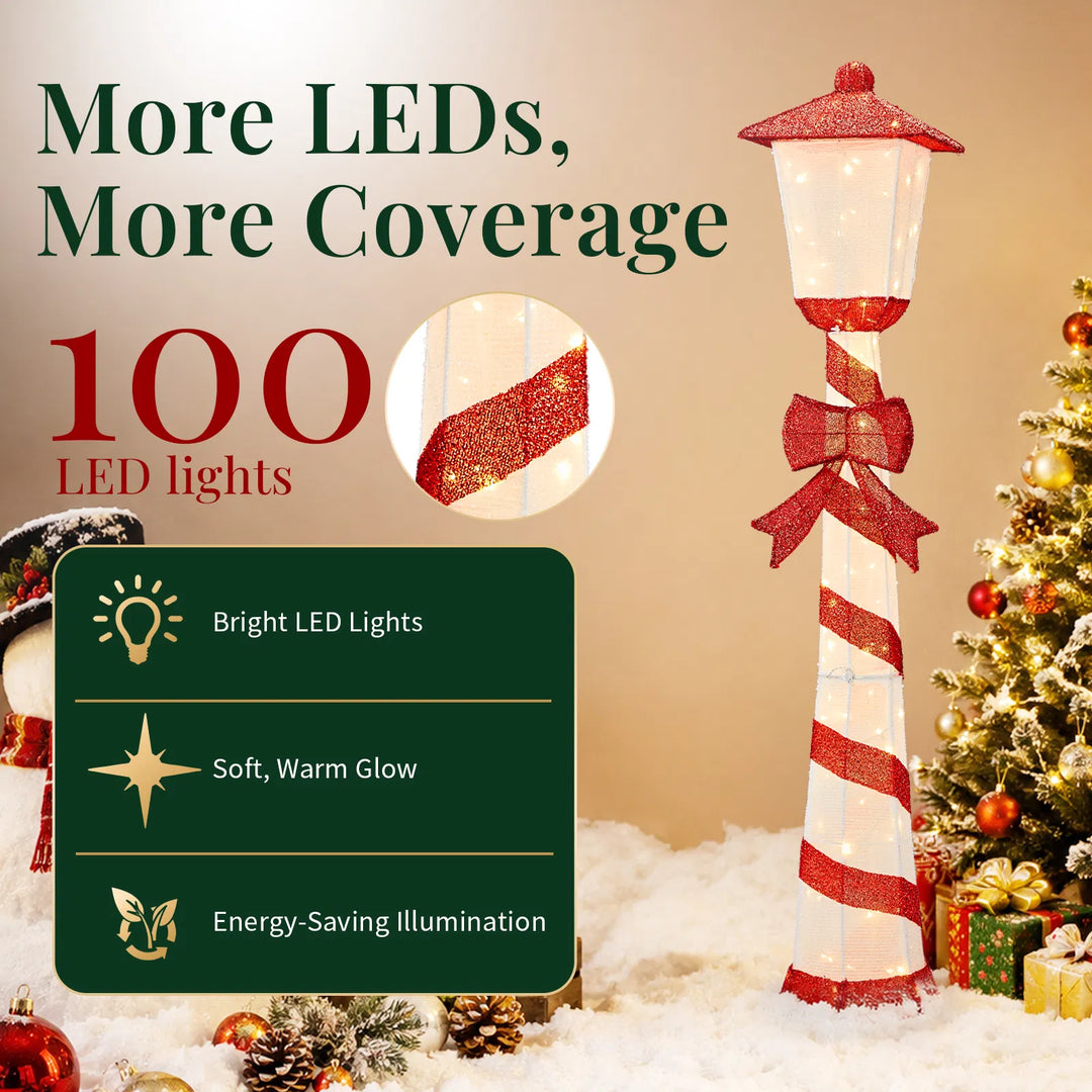 Lighted candy cane striped Christmas lamp post on a porch