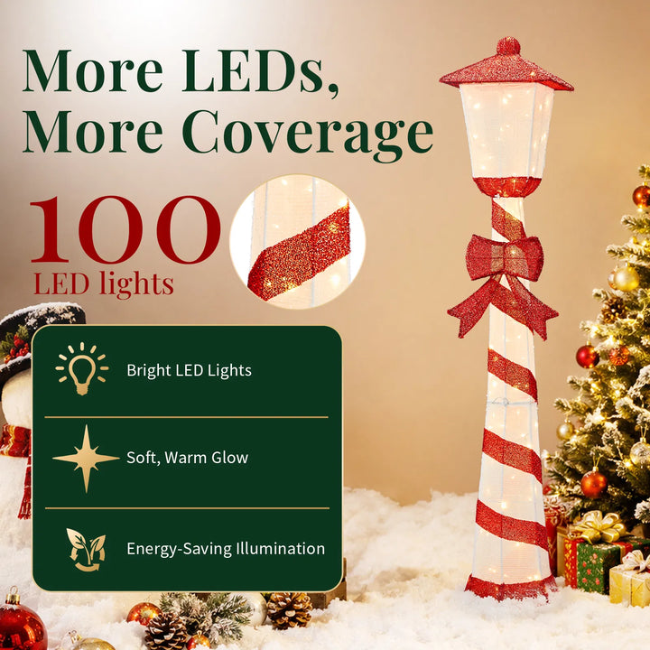 Lighted candy cane striped Christmas lamp post on a porch