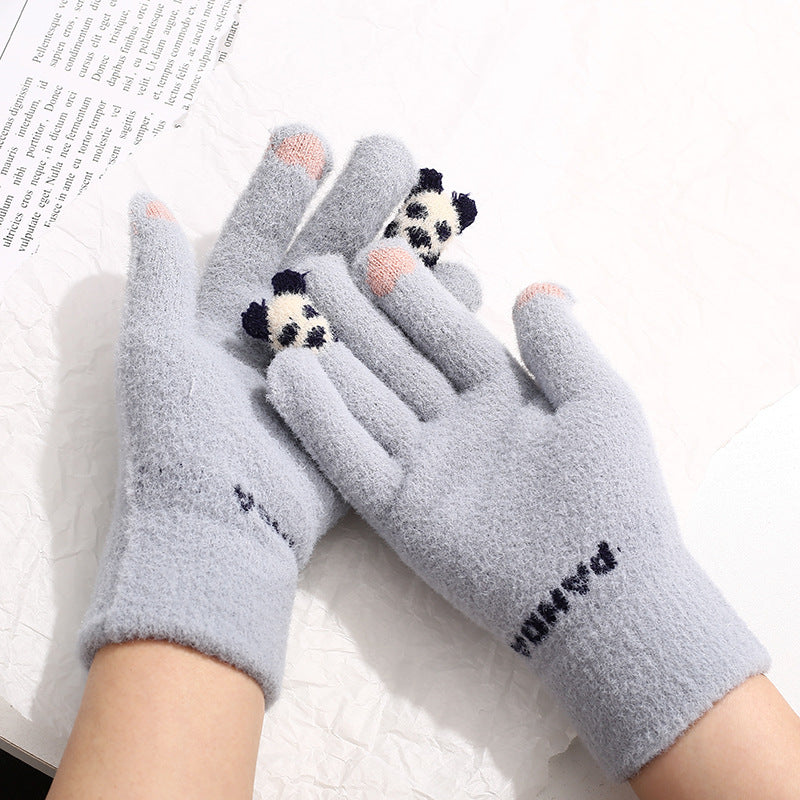Pink knit gloves with small 3D panda