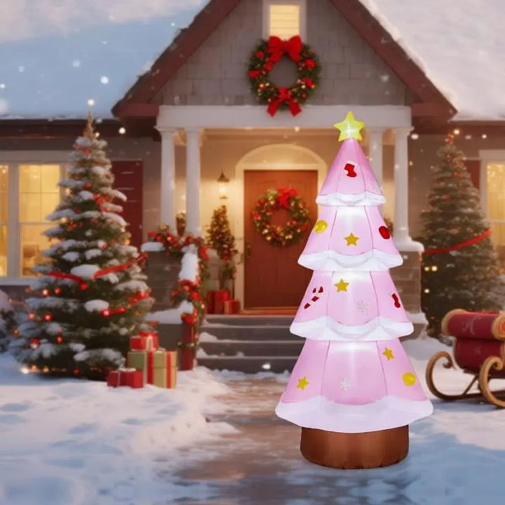 Giant pink inflatable Christmas tree glowing