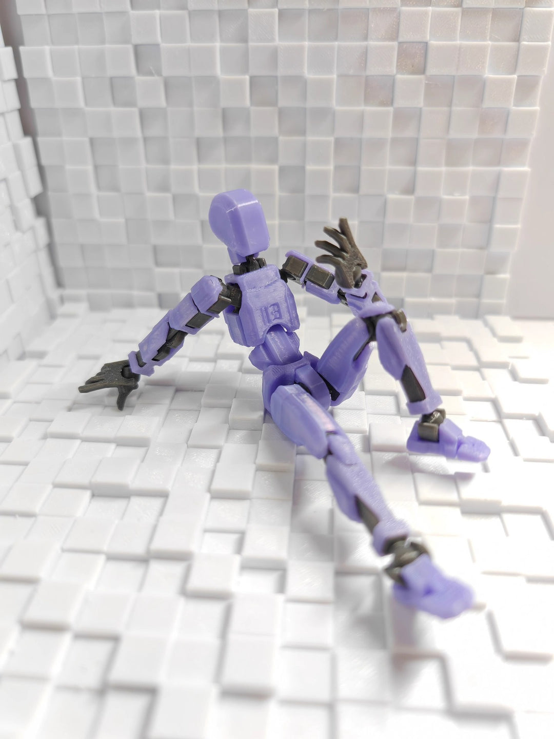 Orange poseable 3D printed robot figure