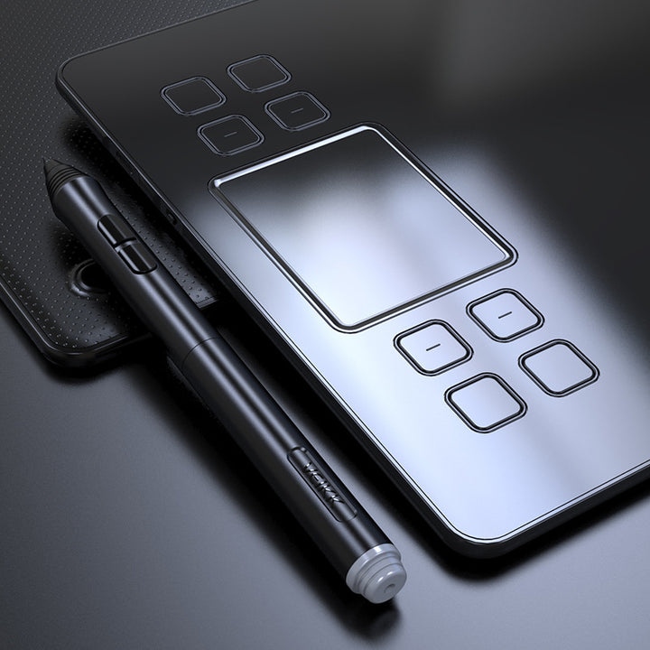 Black graphics drawing tablet with pen
