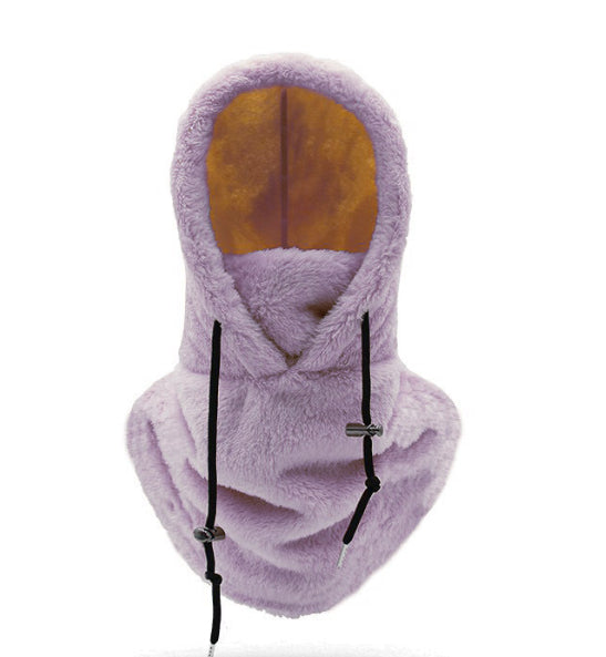 Woman wearing a plush hooded scarf
