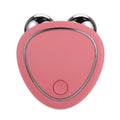 Pink handheld face roller massager with two metal balls