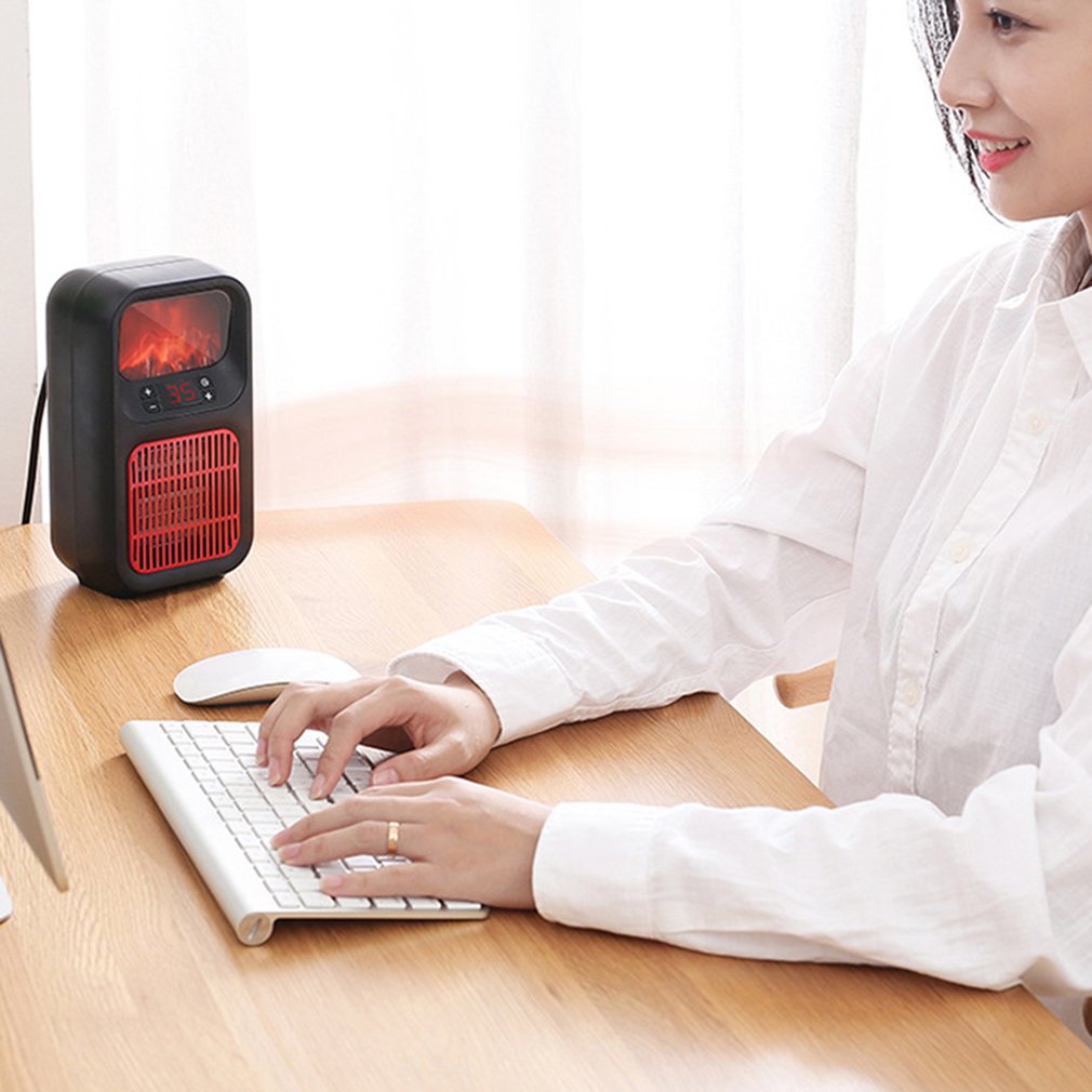 Black mini plug-in heater with flame effect