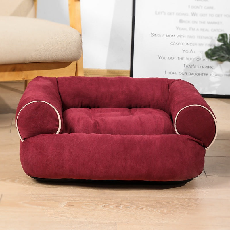 Plush sofa-style pet bed with bolsters