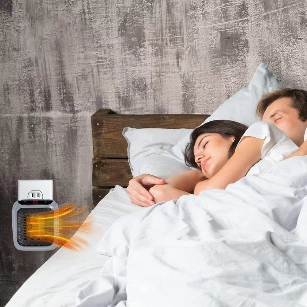 Small outlet heater with digital display and remote