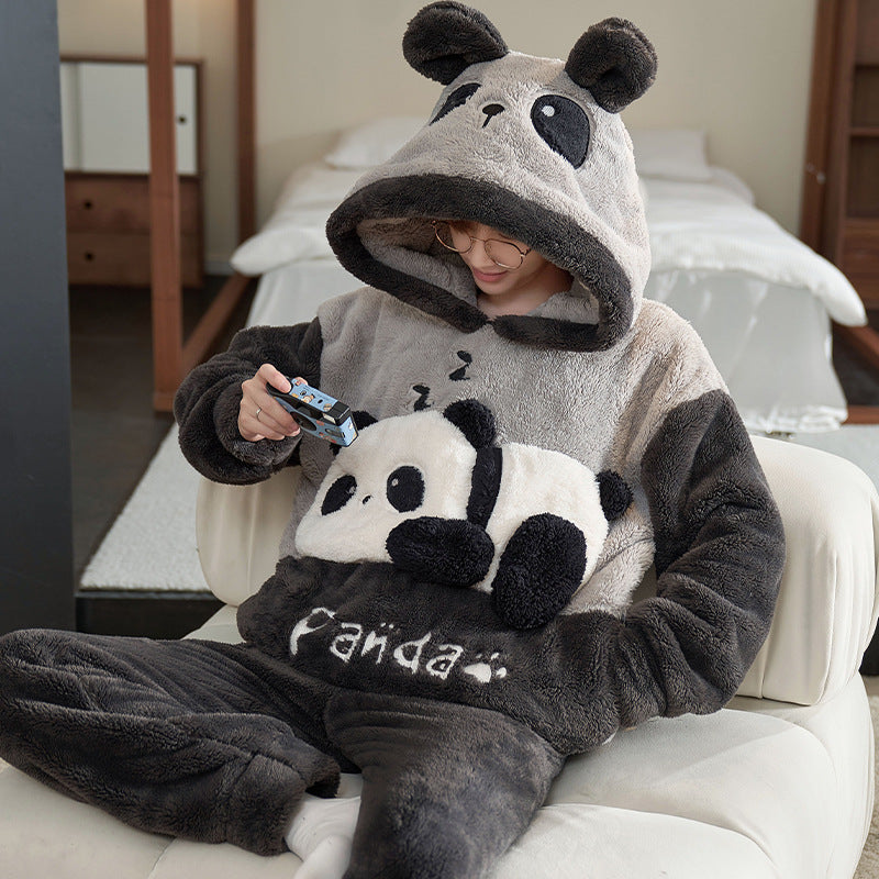 Man in a husky coral fleece hooded pajama set