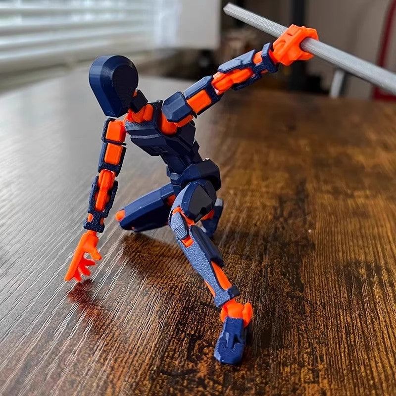 Orange poseable 3D printed robot figure