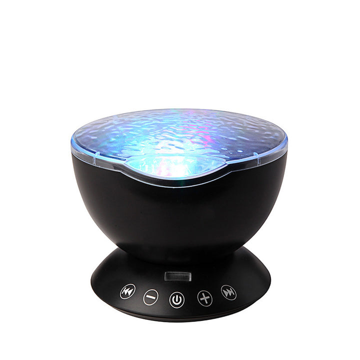 Ocean wave projector lighting a bedroom