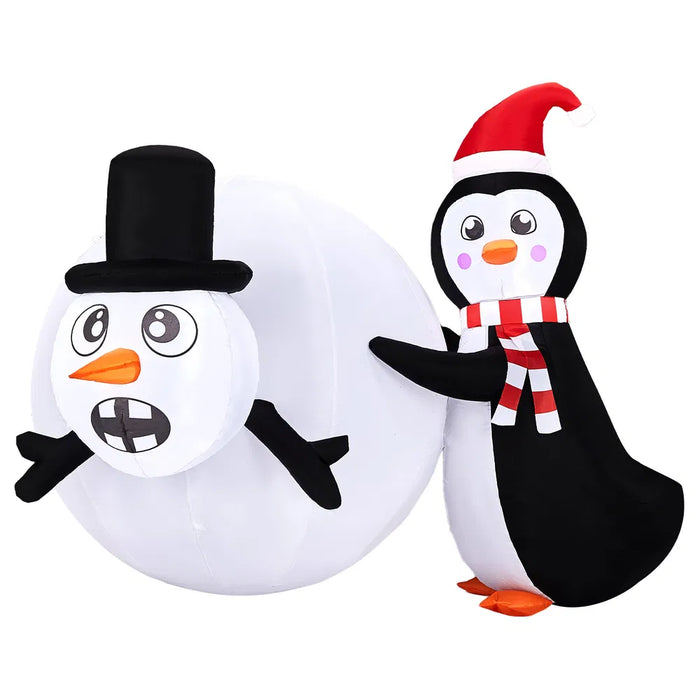 Plushridge 4 ft Inflatable Penguin Rolling a Giant Snowball