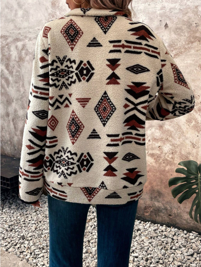 Woman in a cream half-zip fleece pullover