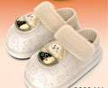 Beige rechargeable heated slippers with display