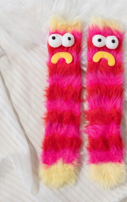 Fluffy purple monster floor socks