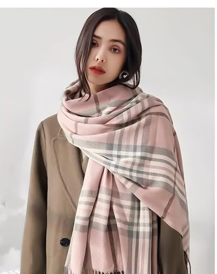 Woman wearing heated plaid scarf