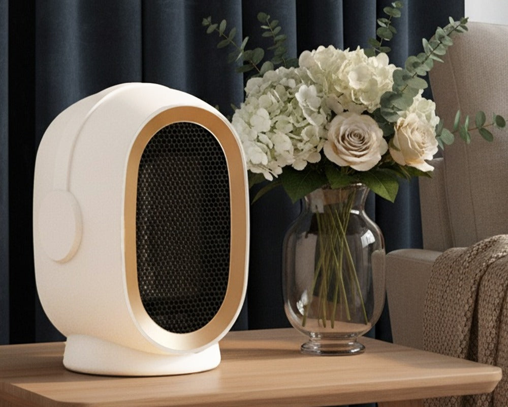 Compact ceramic space heater on desk