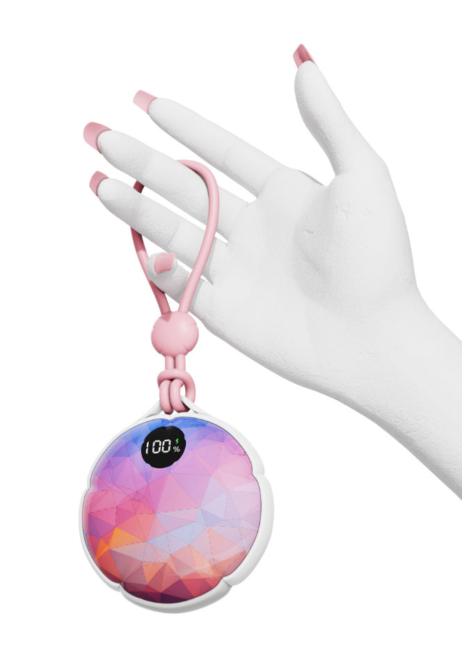 Pocket rechargeable hand warmer in hand