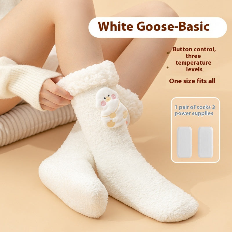 Plush heated socks with a pink deer badge
