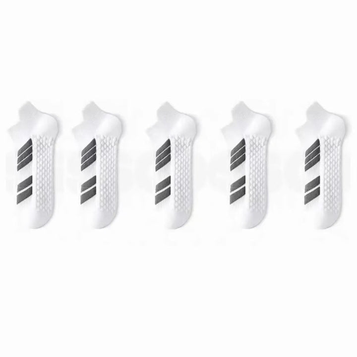 Stack of white low-cut cotton ankle socks
