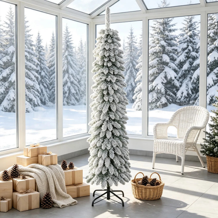 Slim snow flocked pencil Christmas tree in corner