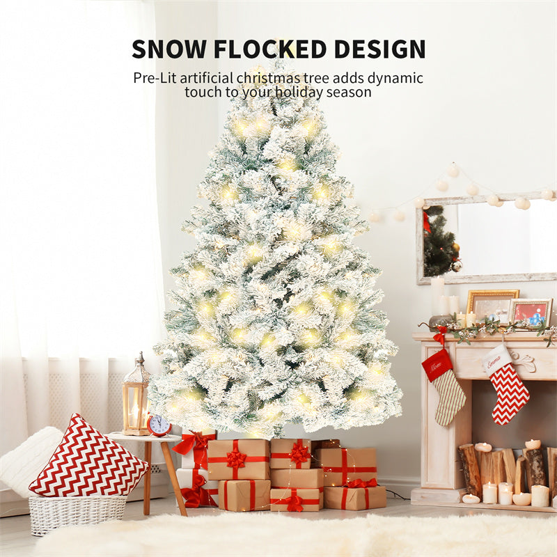 Snow-flocked white Christmas tree with warm-white lights