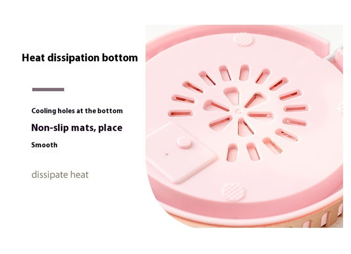 Mug on a round heated coaster with metallic rim