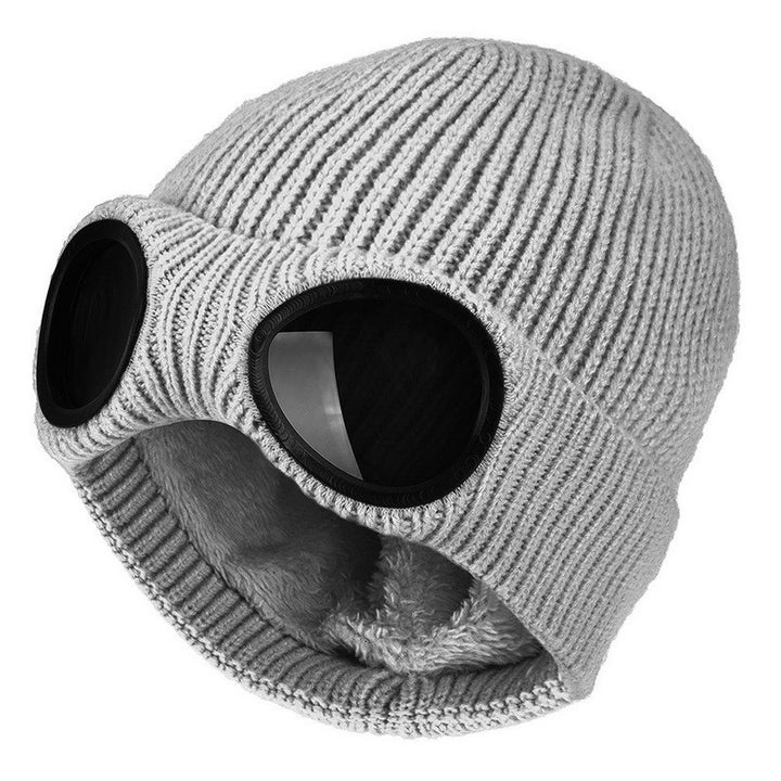 Knit beanie with flip-up goggles on front