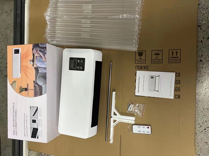 White wall-mounted warm air heater with towel rail