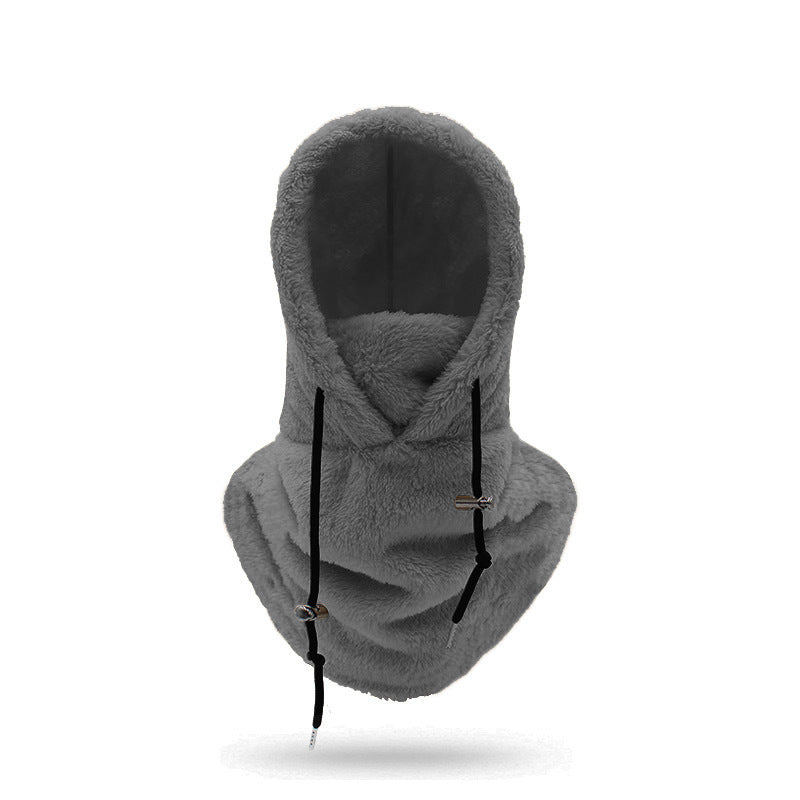 Woman wearing a plush hooded scarf