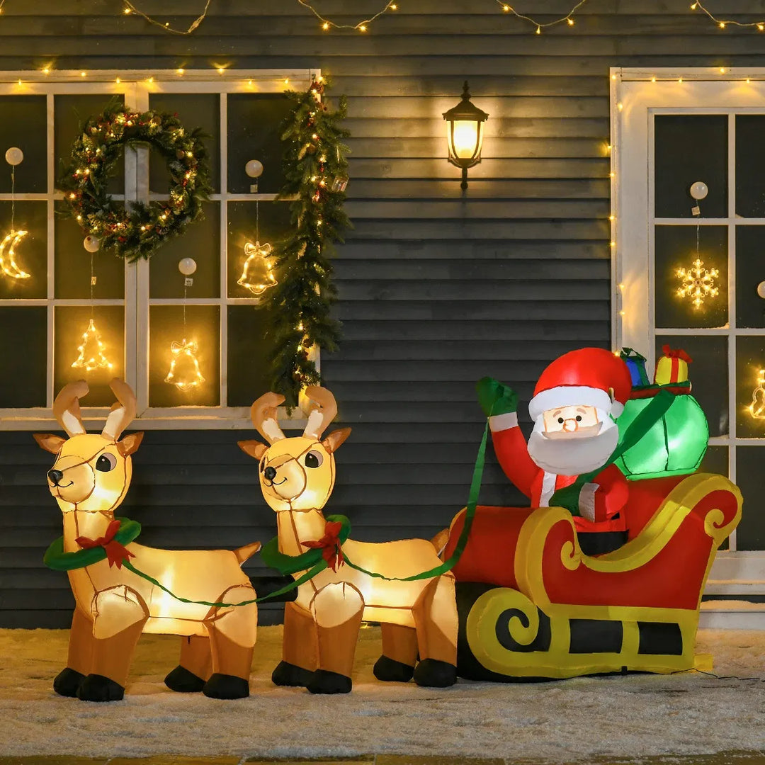 Inflatable lighted Santa in sleigh with two reindeer