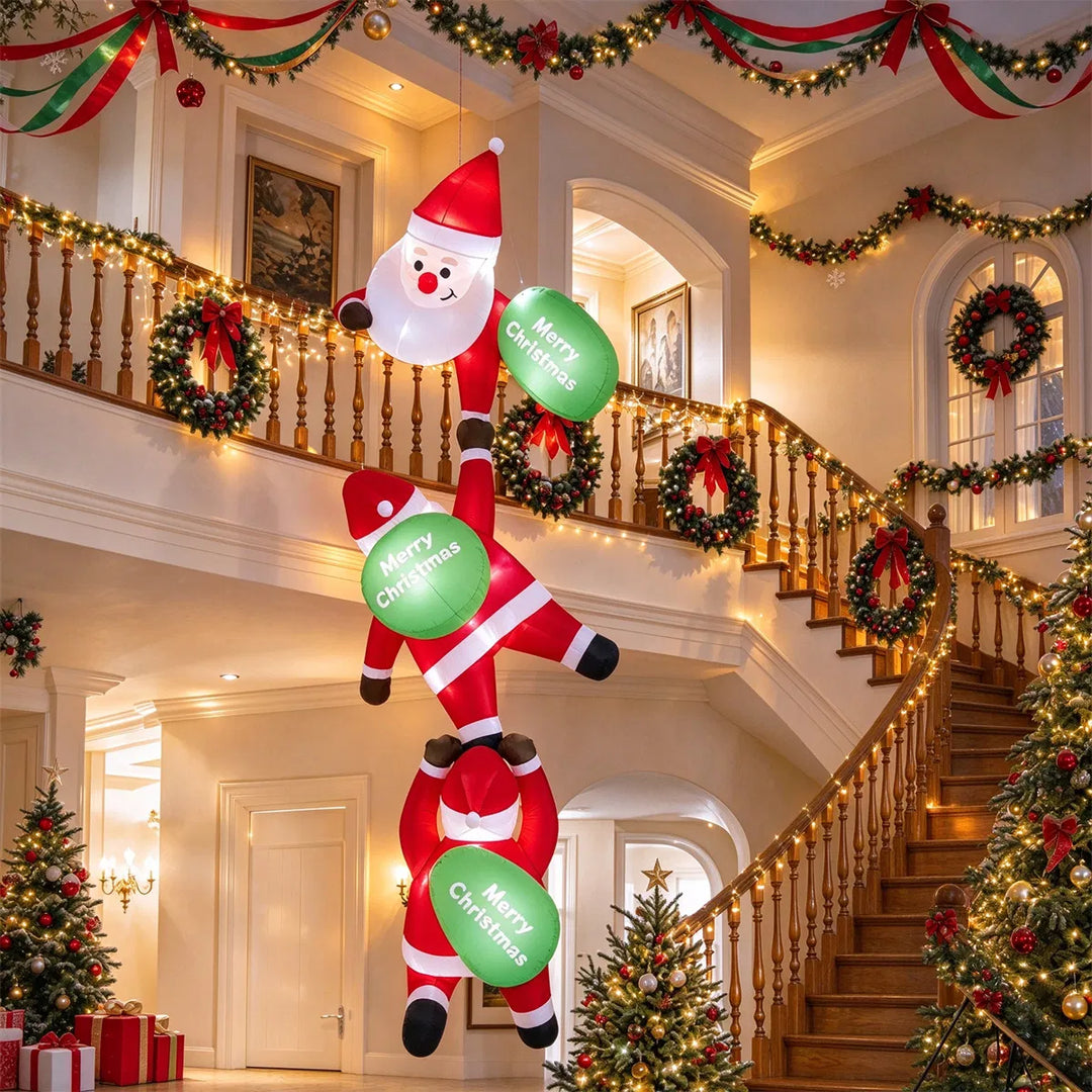 Three inflatable Santas climbing a balcony