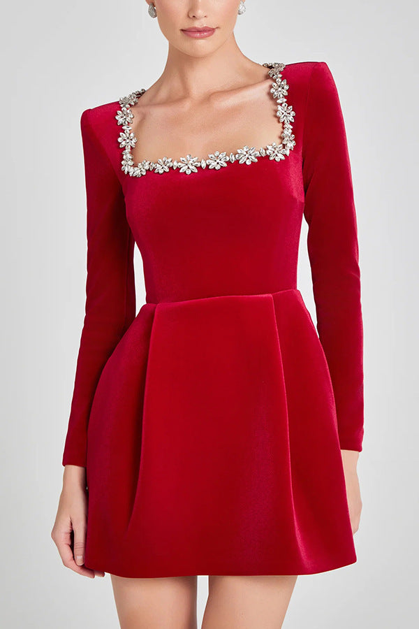 Black mini dress with rhinestone neckline