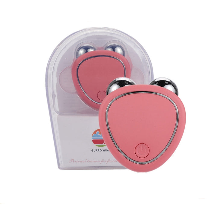 Pink handheld face roller massager with two metal balls