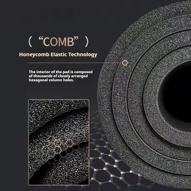 Rolled black yoga mat with carry strap