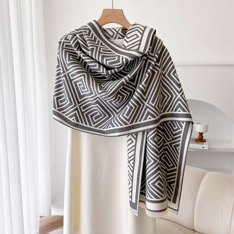 Woman wearing fringe shawl cape